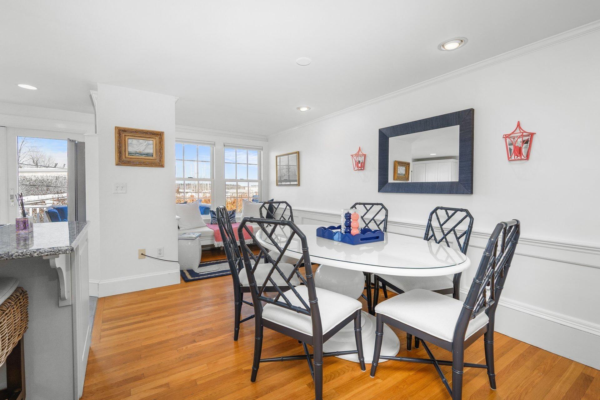 25 Main Street, Unit 3 Marion Center, MA 02738 - Photo 8 of 32 a view of a dining room with furniture and wooden floor