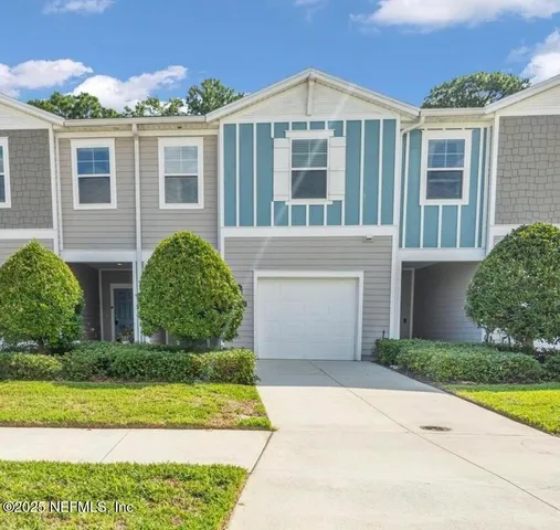 a front view of house with yard