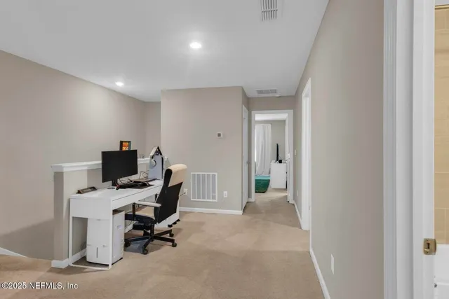 a view of workspace with livingroom