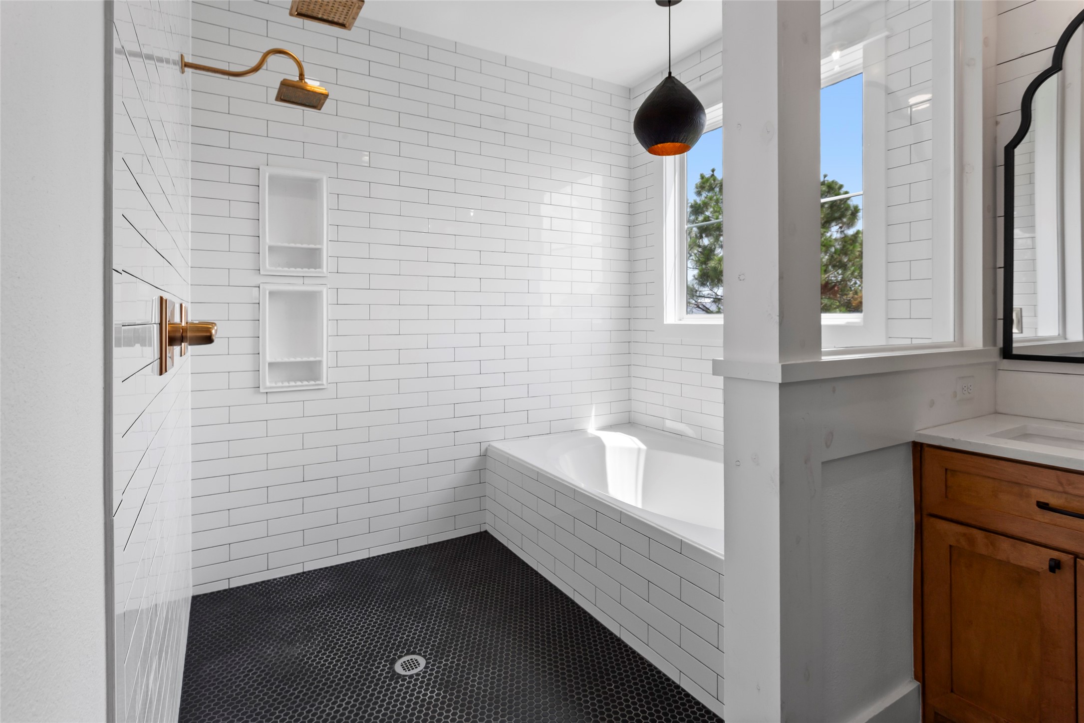 4473 County Road 172 Alvin, TX 77511 - Photo 22 of 36 Primary bathroom with large shower area, and deep soaking tub with tile surround