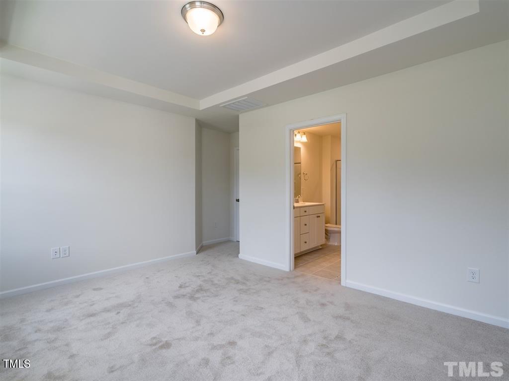 4035 Mahal Avenue Cary, NC 27519 - Photo 16 of 29 a view of an empty room and a window