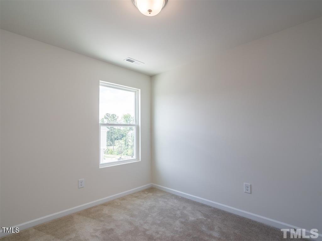 4035 Mahal Avenue Cary, NC 27519 - Photo 18 of 29 an empty room with a window