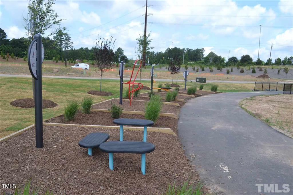 4035 Mahal Avenue Cary, NC 27519 - Photo 24 of 29 a view of a garden with sitting area