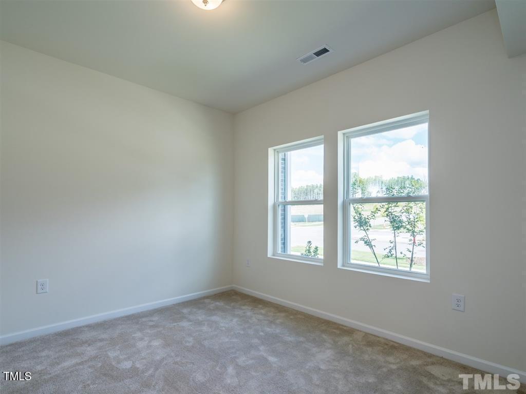 4035 Mahal Avenue Cary, NC 27519 - Photo 4 of 29 an empty room with a window