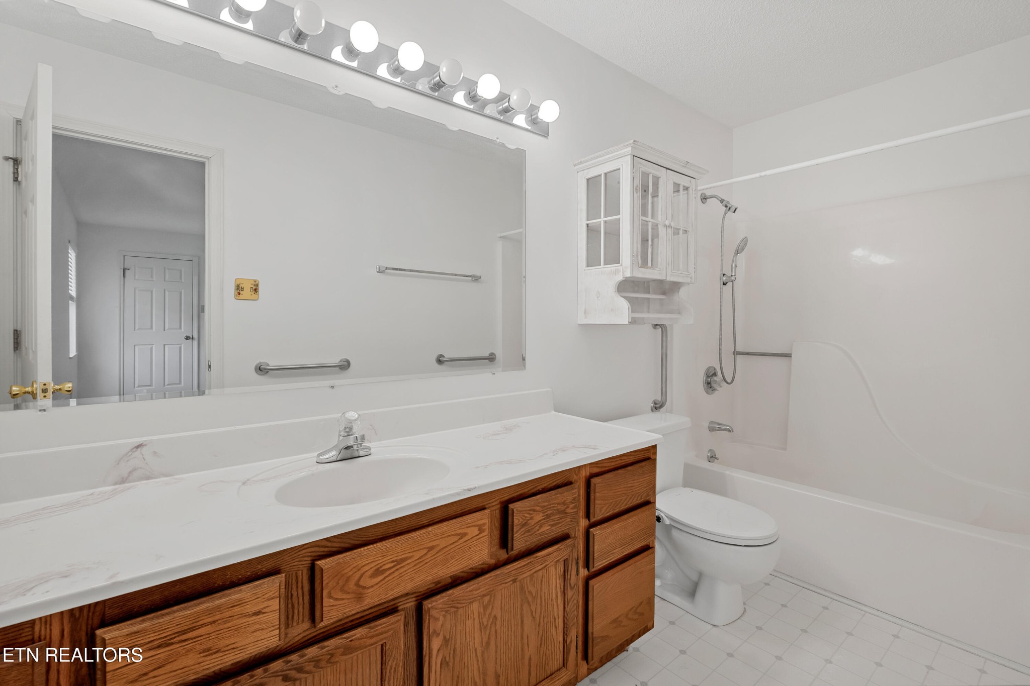 2036 Little Best Road Maryville, TN 37803 - Photo 18 of 54 a bathroom with a sink a toilet and shower