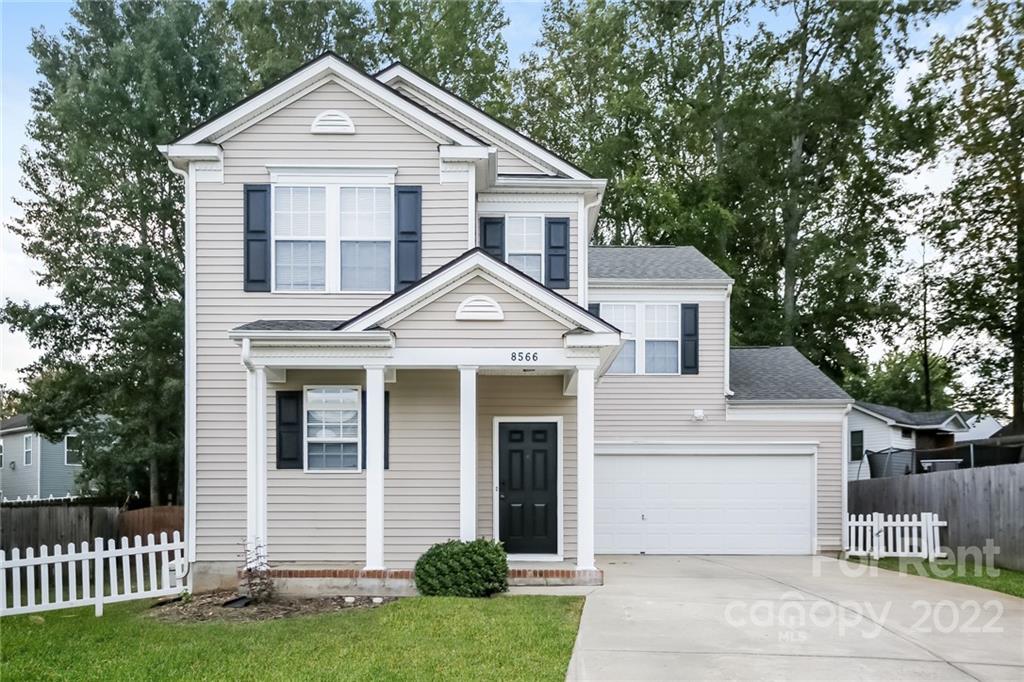 8566 Filbert Lane Charlotte, NC 28215 - Photo 20 of 32 a front view of a house with a yard