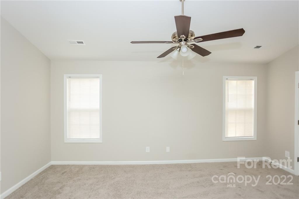 8566 Filbert Lane Charlotte, NC 28215 - Photo 24 of 32 a view of an empty room with a window
