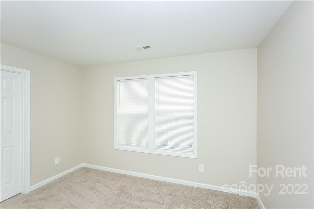 8566 Filbert Lane Charlotte, NC 28215 - Photo 27 of 32 an empty room with a window
