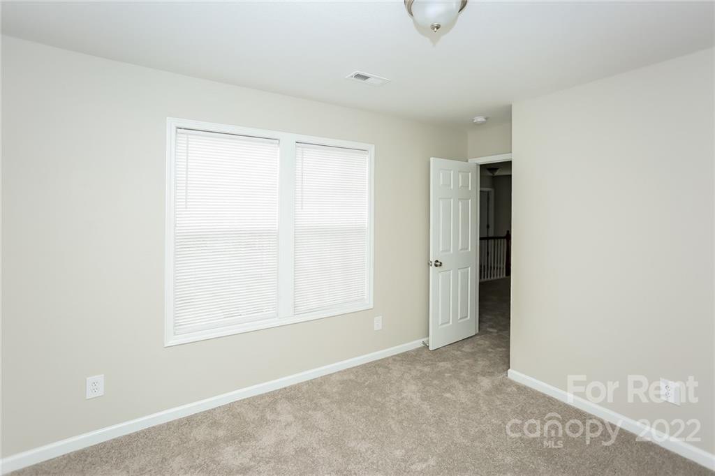 8566 Filbert Lane Charlotte, NC 28215 - Photo 28 of 32 a view of an empty room with window