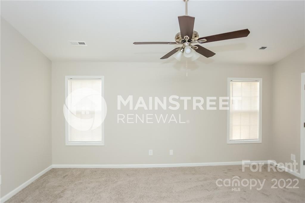 8566 Filbert Lane Charlotte, NC 28215 - Photo 9 of 32 a view of an entryway with a window