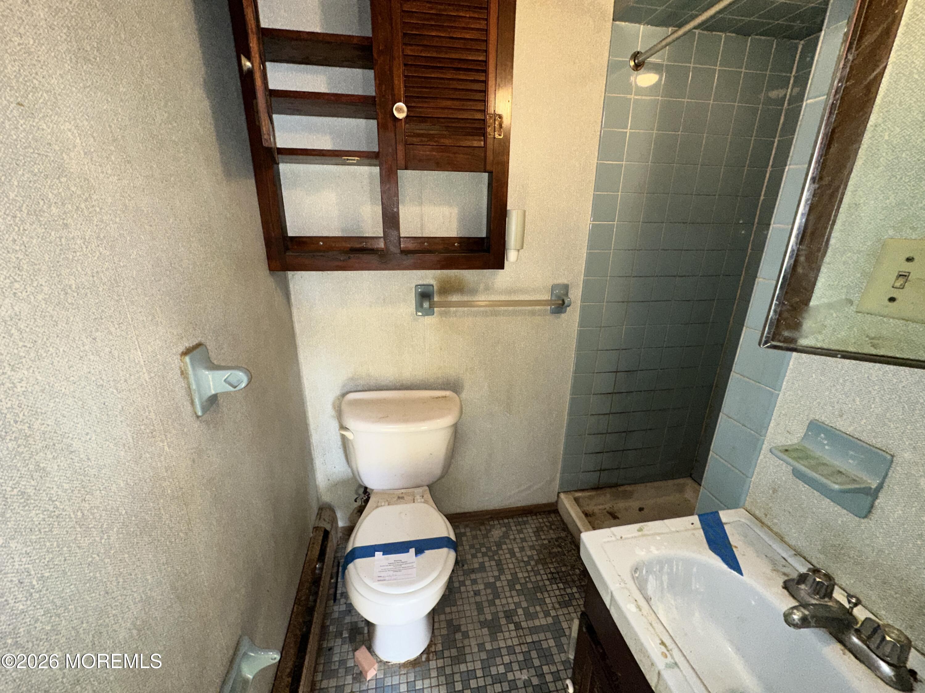 1894 West 4th Street Dunellen, NJ 08812 - Photo 15 of 23 a bathroom with a toilet and a sink