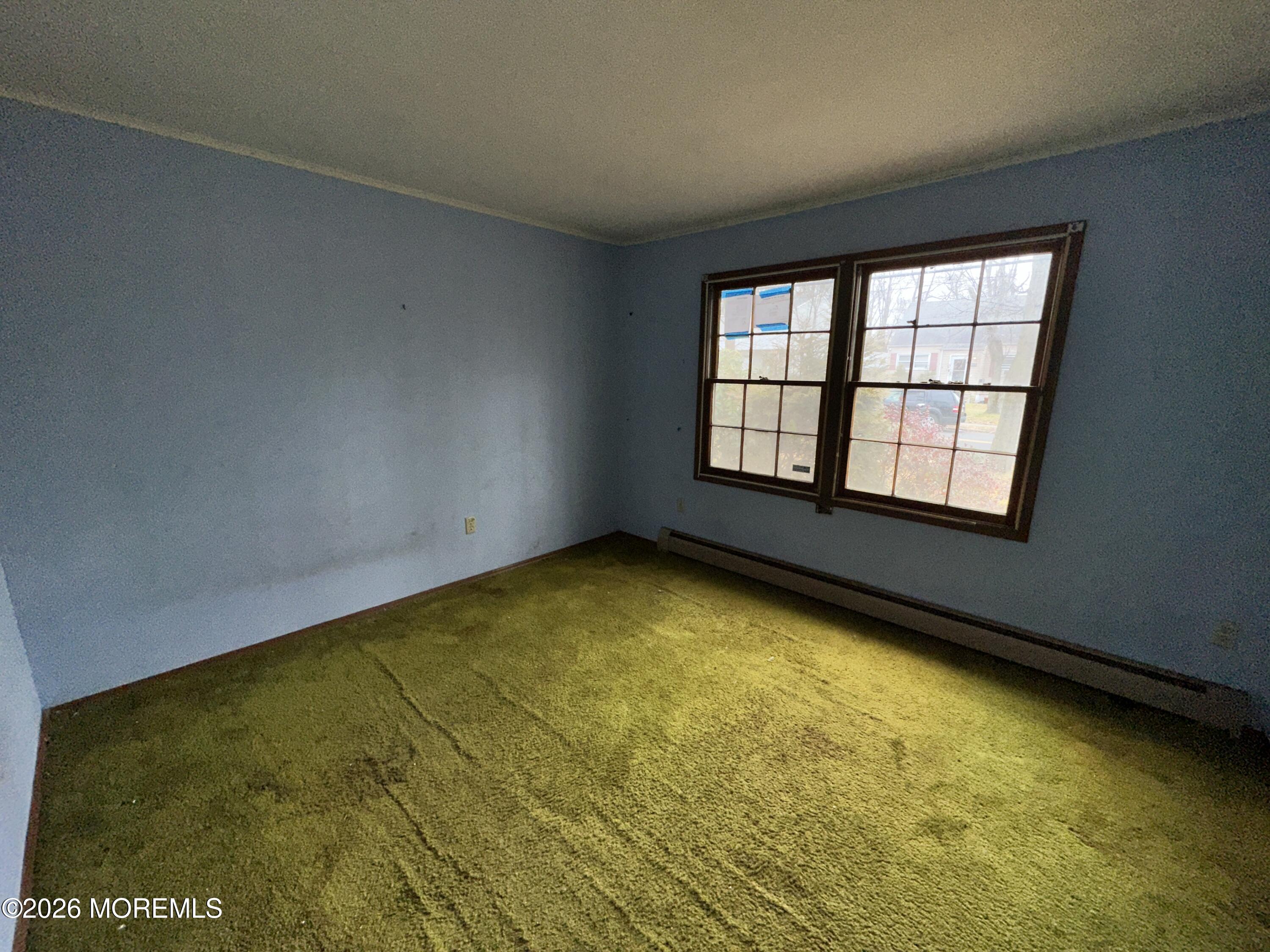 1894 West 4th Street Dunellen, NJ 08812 - Photo 7 of 23 a view of an empty room with a window