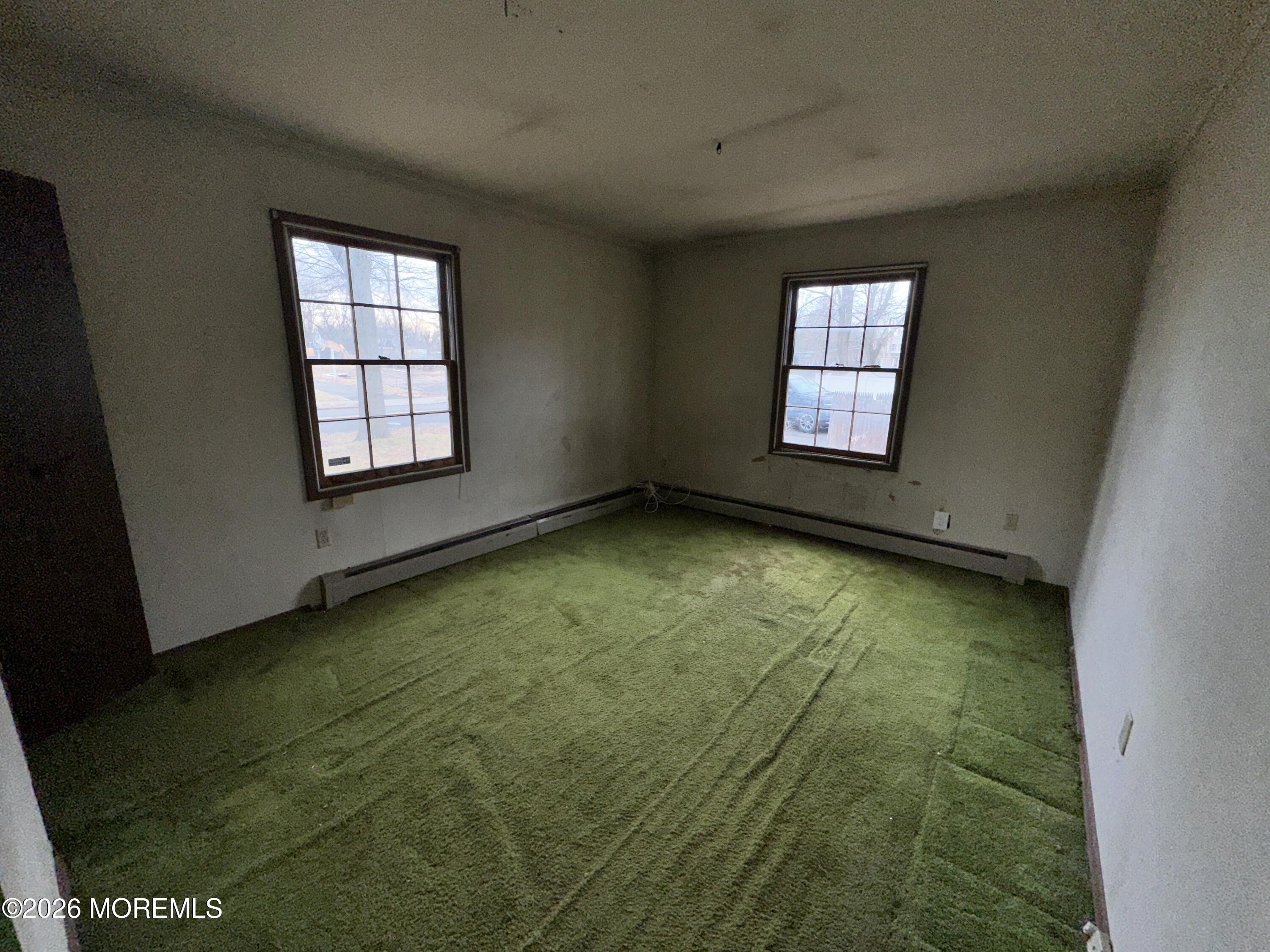1894 West 4th Street Dunellen, NJ 08812 - Photo 8 of 23 an empty room with windows