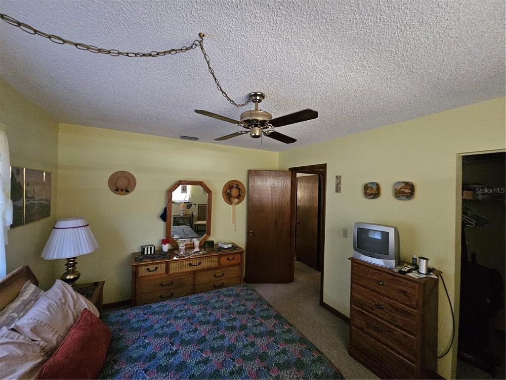 9115 Southwest 102nd Lane Ocala, FL 34481 - Photo 19 of 30 a living room with furniture and wooden floor