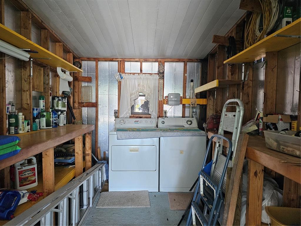 9115 Southwest 102nd Lane Ocala, FL 34481 - Photo 25 of 30 a room with lots of appliances and a window