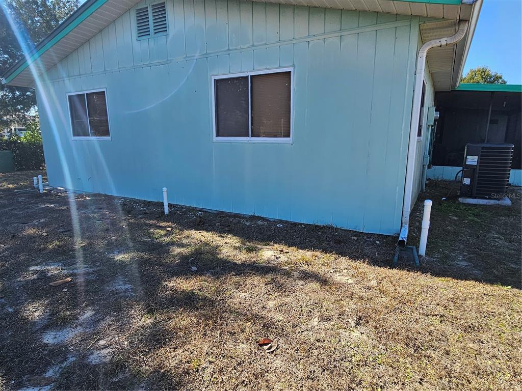 9115 Southwest 102nd Lane Ocala, FL 34481 - Photo 29 of 30 a view of a backyard of a house