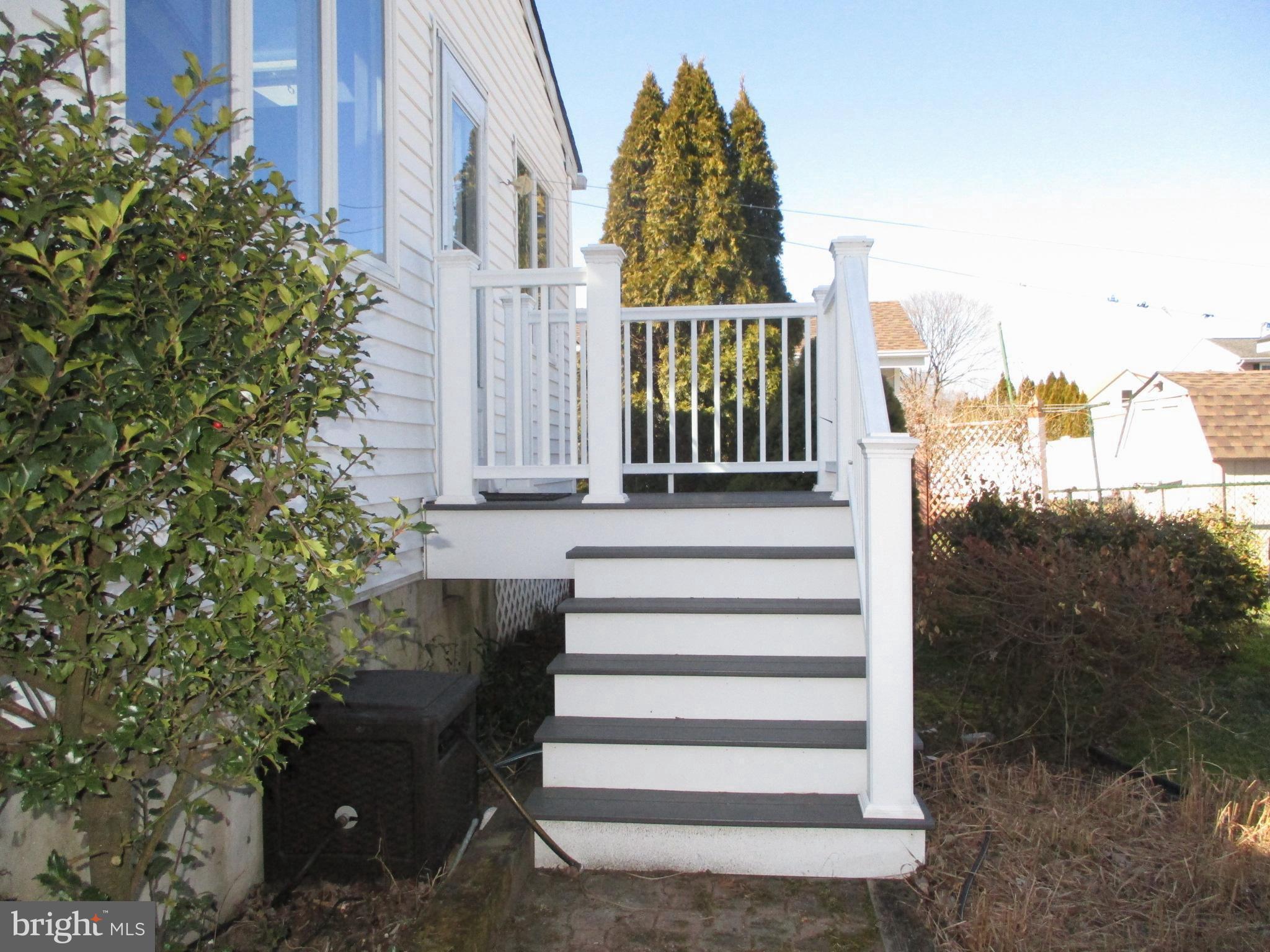 22 Sycamore Way Hamilton, NJ 08690 - Photo 38 of 44 Stairs and Deck off Kitchen