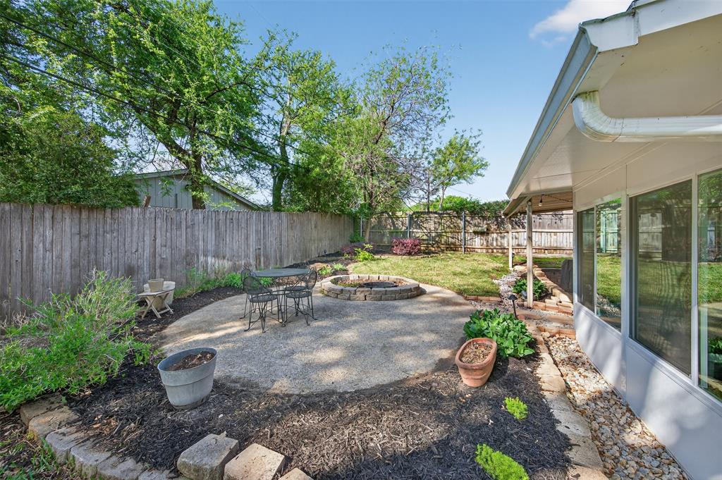 5008 Marble Falls Road Fort Worth, TX 76103 - Photo 23 of 33 a view of a chair and table in backyard