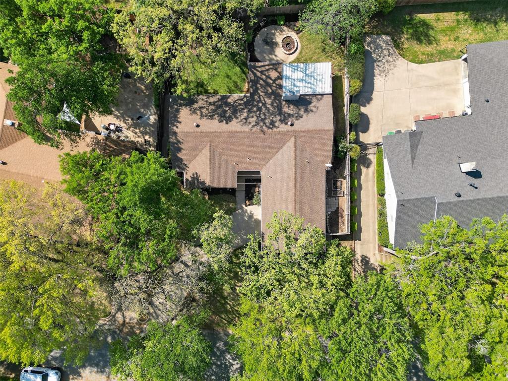 5008 Marble Falls Road Fort Worth, TX 76103 - Photo 30 of 33 an aerial view of a house with a yard and garden