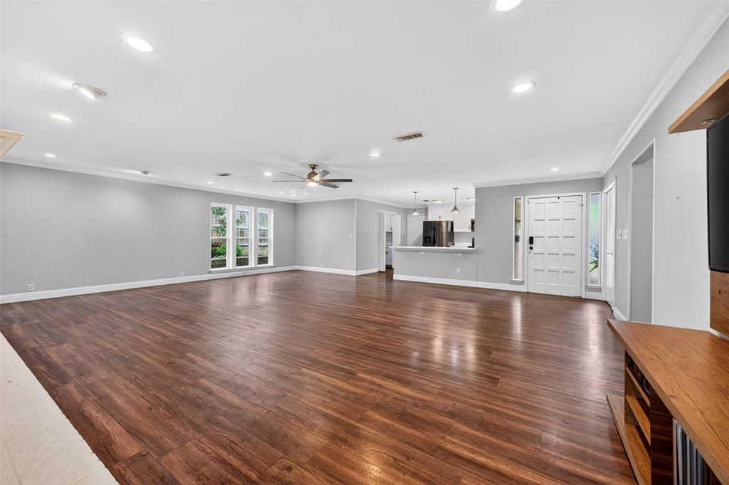 5008 Marble Falls Road Fort Worth, TX 76103 - Photo 5 of 33 a view of empty room with wooden floor