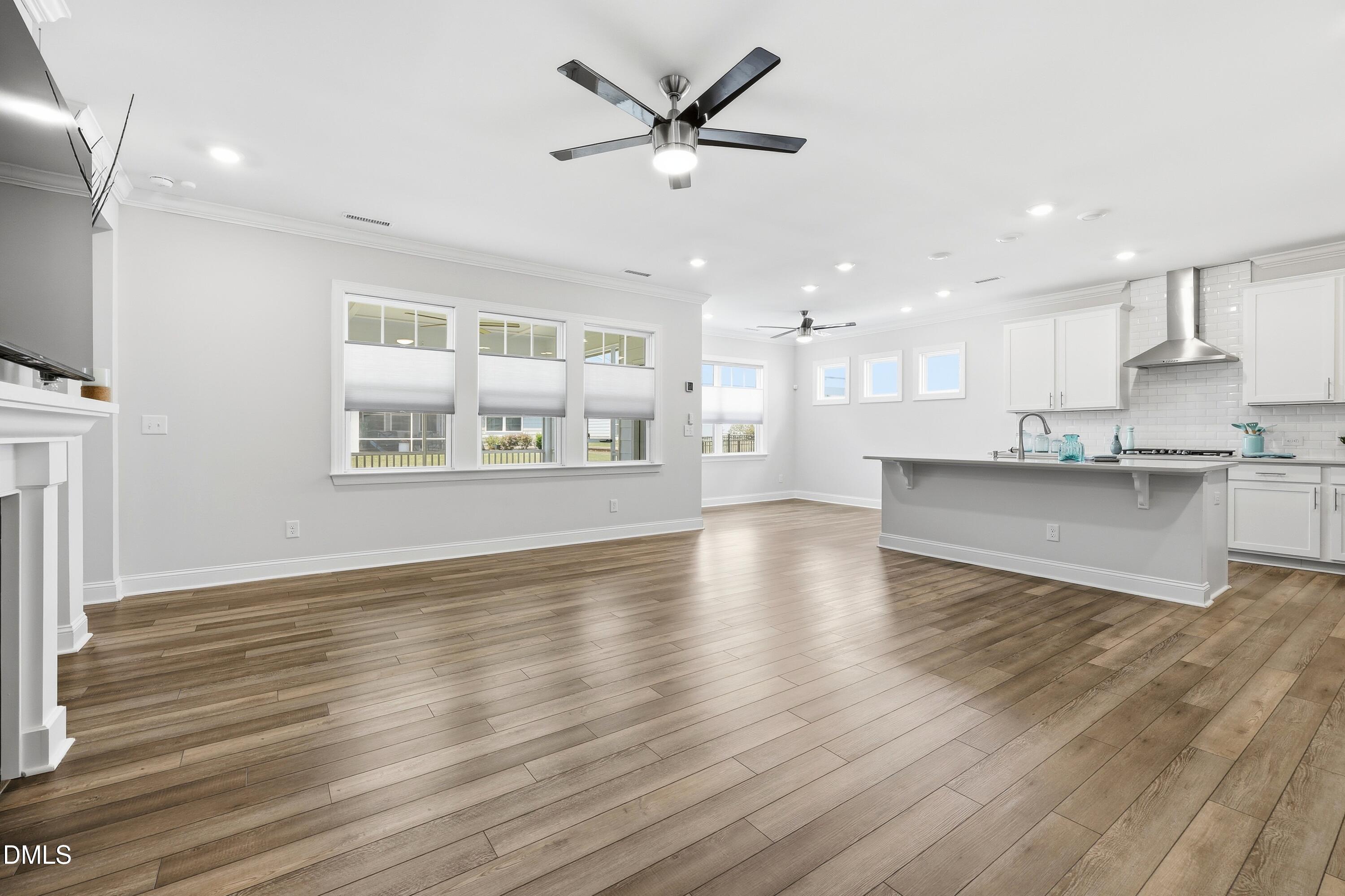289 English Violet Lane Raleigh, NC 27610 - Photo 40 of 40 a view of kitchen with wooden floor and a window