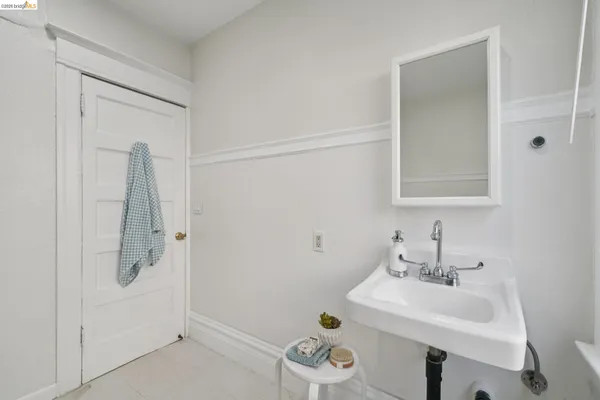 a bathroom with a toilet and a sink