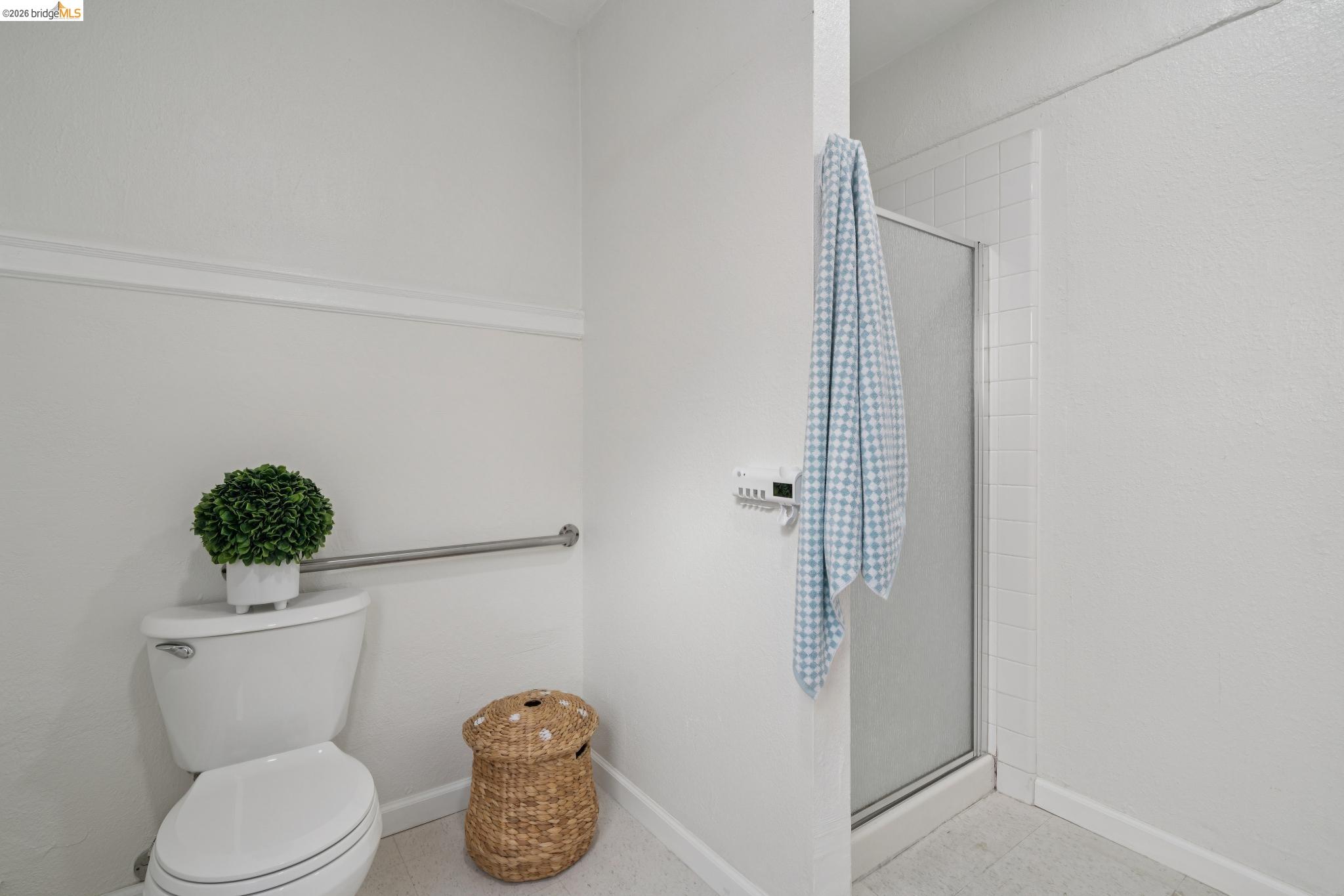 2923 Wheeler Street Berkeley, CA 94705 - Photo 14 of 28 Bathroom with baseboards and a shower stall