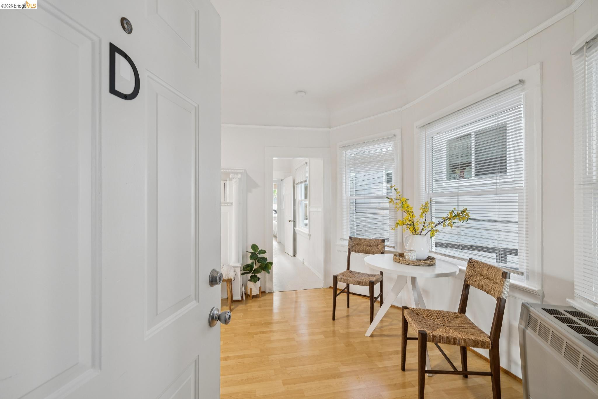 2923 Wheeler Street Berkeley, CA 94705 - Photo 2 of 28 Foyer featuring radiator and light wood-type flooring