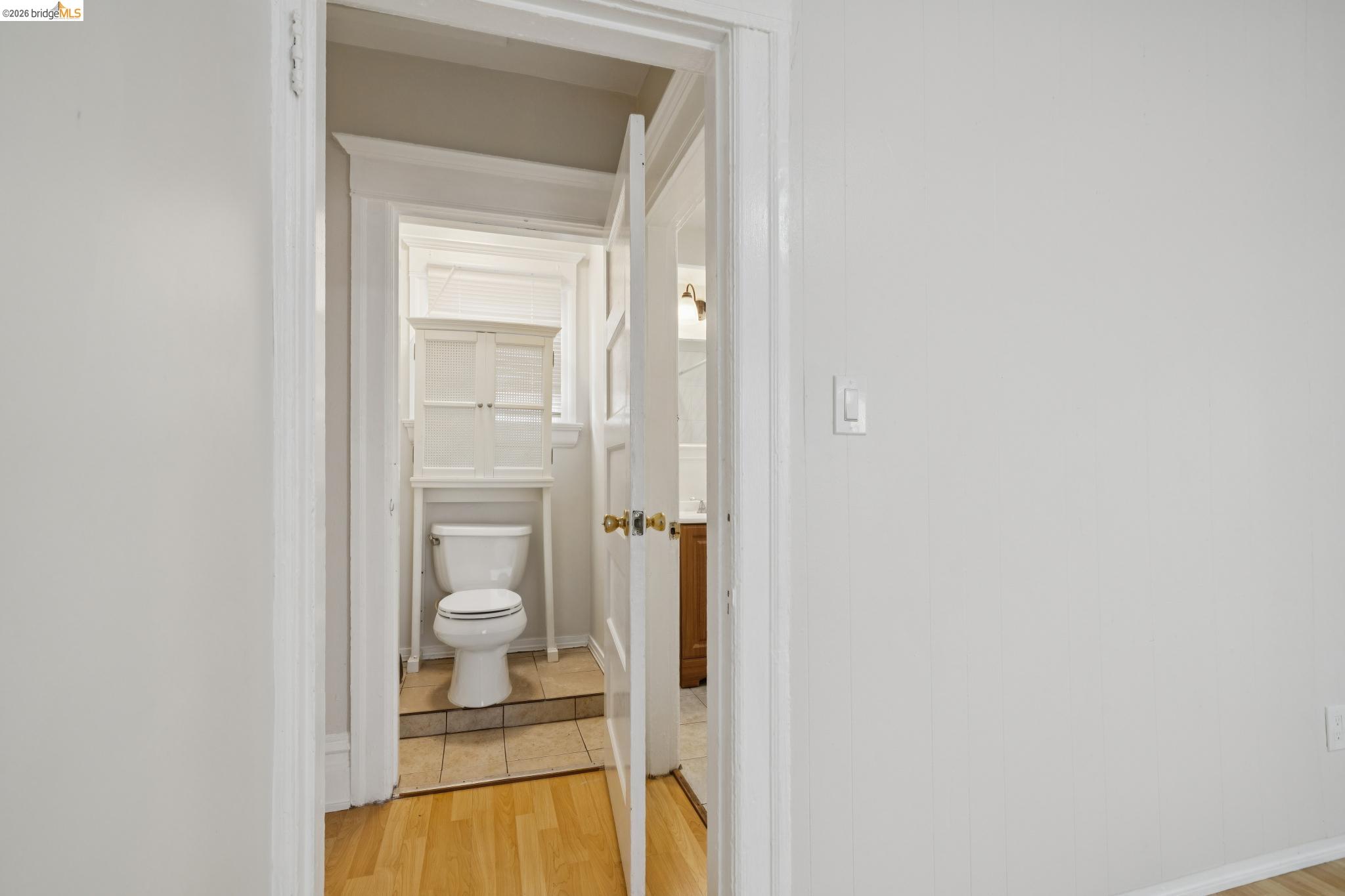 2923 Wheeler Street Berkeley, CA 94705 - Photo 25 of 28 Bathroom with light wood finished floors and toilet