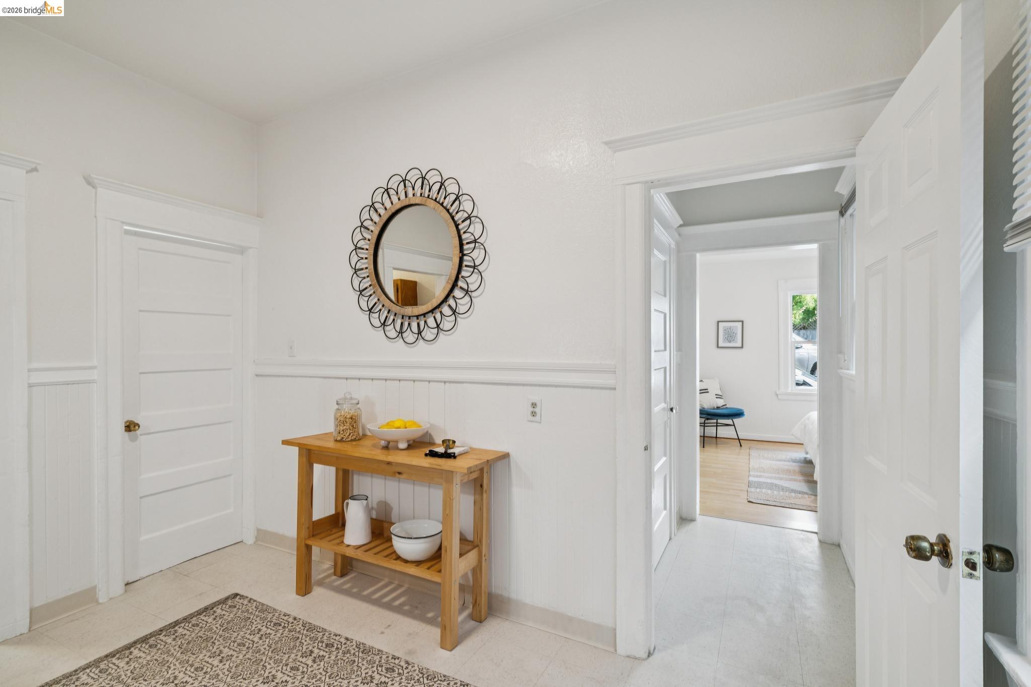 2923 Wheeler Street Berkeley, CA 94705 - Photo 8 of 28 Corridor with a wainscoted wall and light tile patterned floors