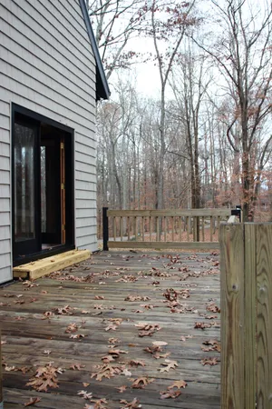 a view of a backyard of the house