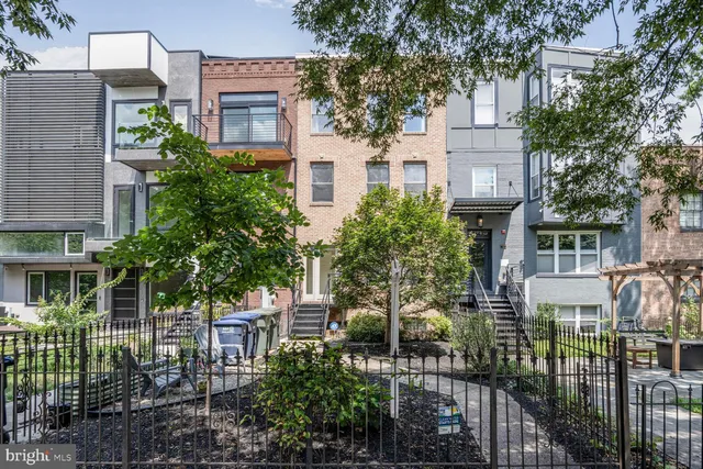 a view of a building with a garden