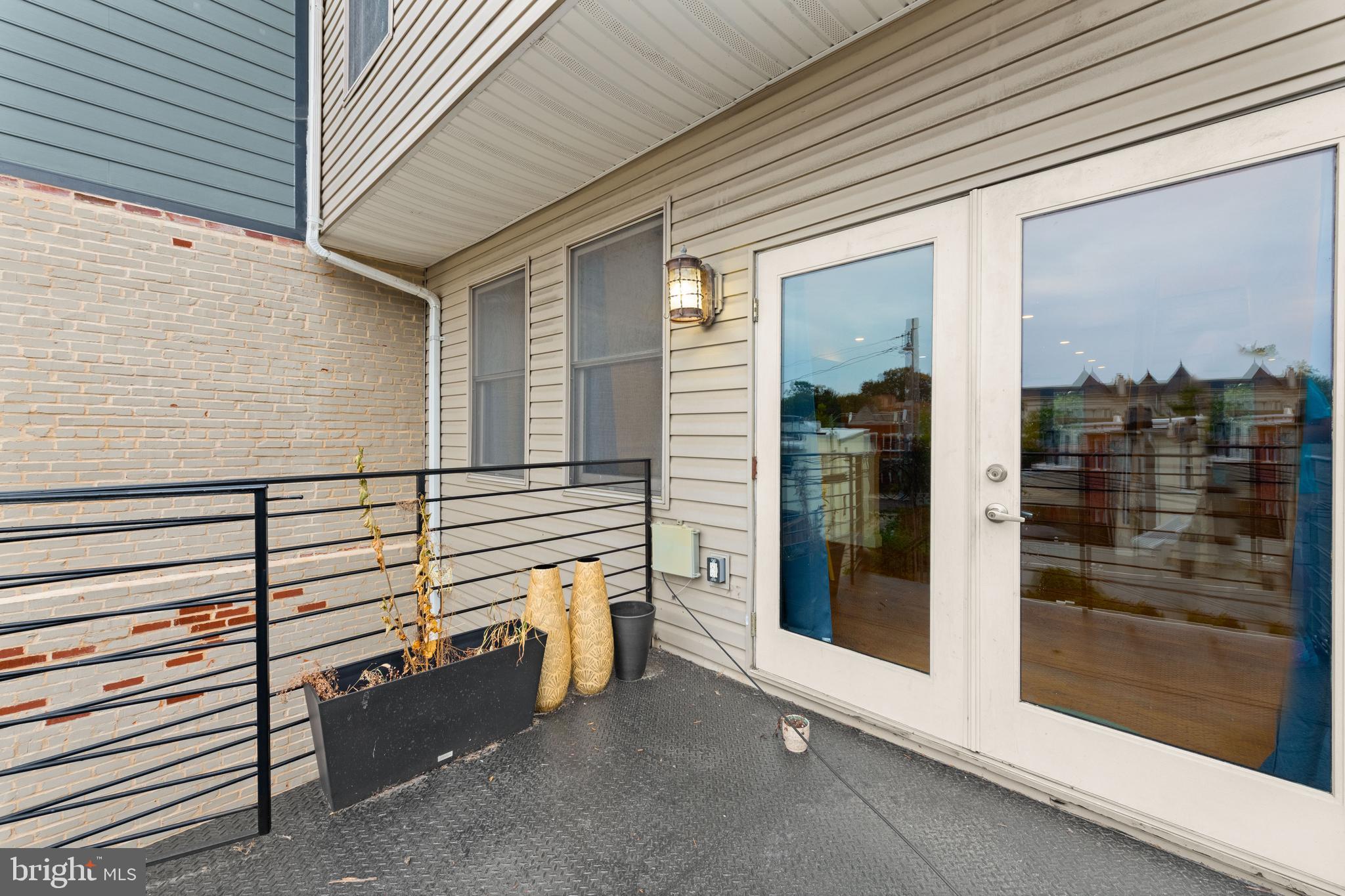 1645 New Jersey Avenue Northwest, Unit 2 Washington, DC 20001 - Photo 22 of 49 a view of a two chairs in the balcony