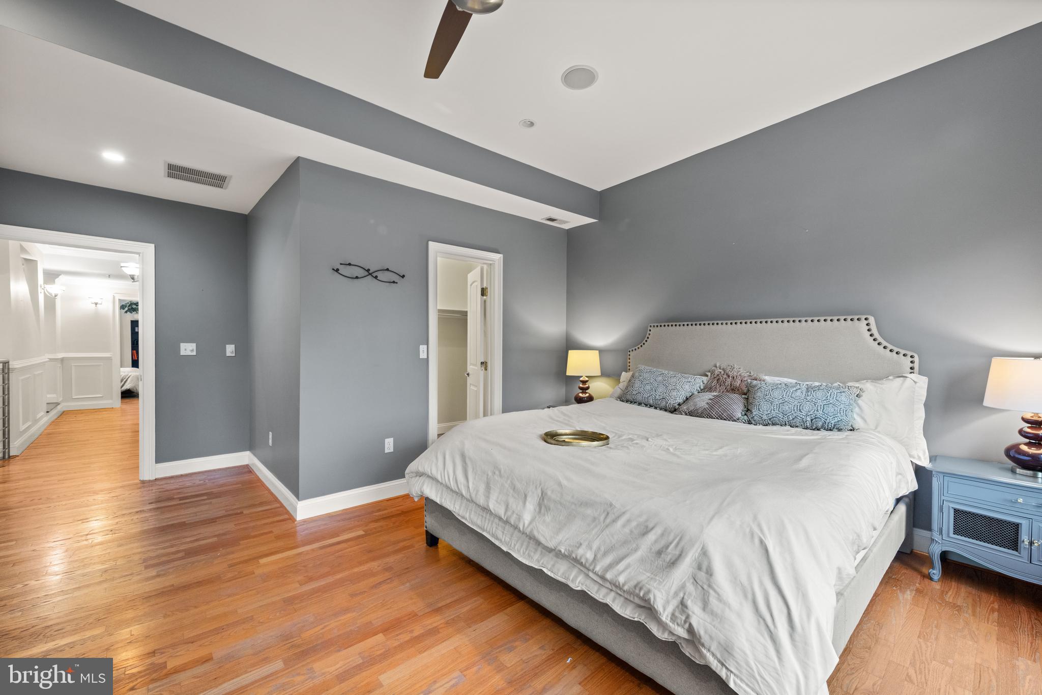 1645 New Jersey Avenue Northwest, Unit 2 Washington, DC 20001 - Photo 28 of 49 a bedroom with a bed and wooden floor