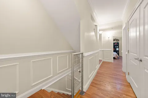 a view of bathroom with a sink and a mirror