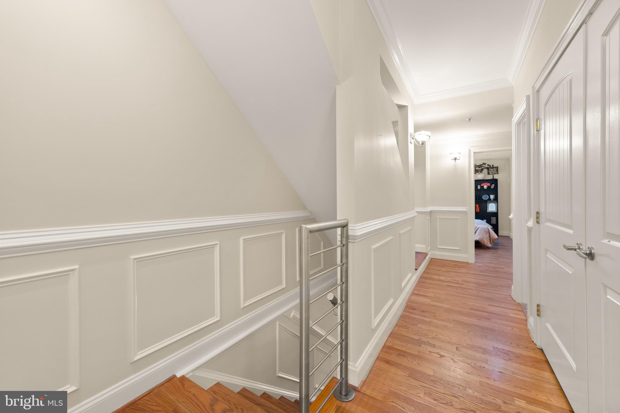 1645 New Jersey Avenue Northwest, Unit 2 Washington, DC 20001 - Photo 35 of 49 a view of a hallway with wooden floor and staircase