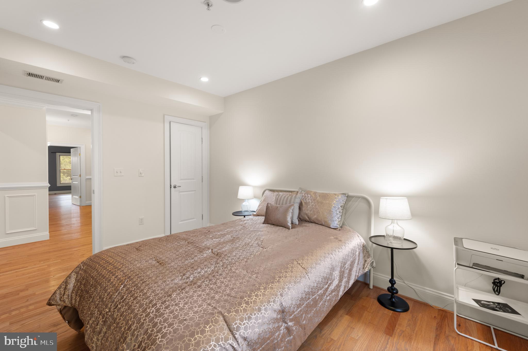 1645 New Jersey Avenue Northwest, Unit 2 Washington, DC 20001 - Photo 38 of 49 a bedroom with a bed and a lamp