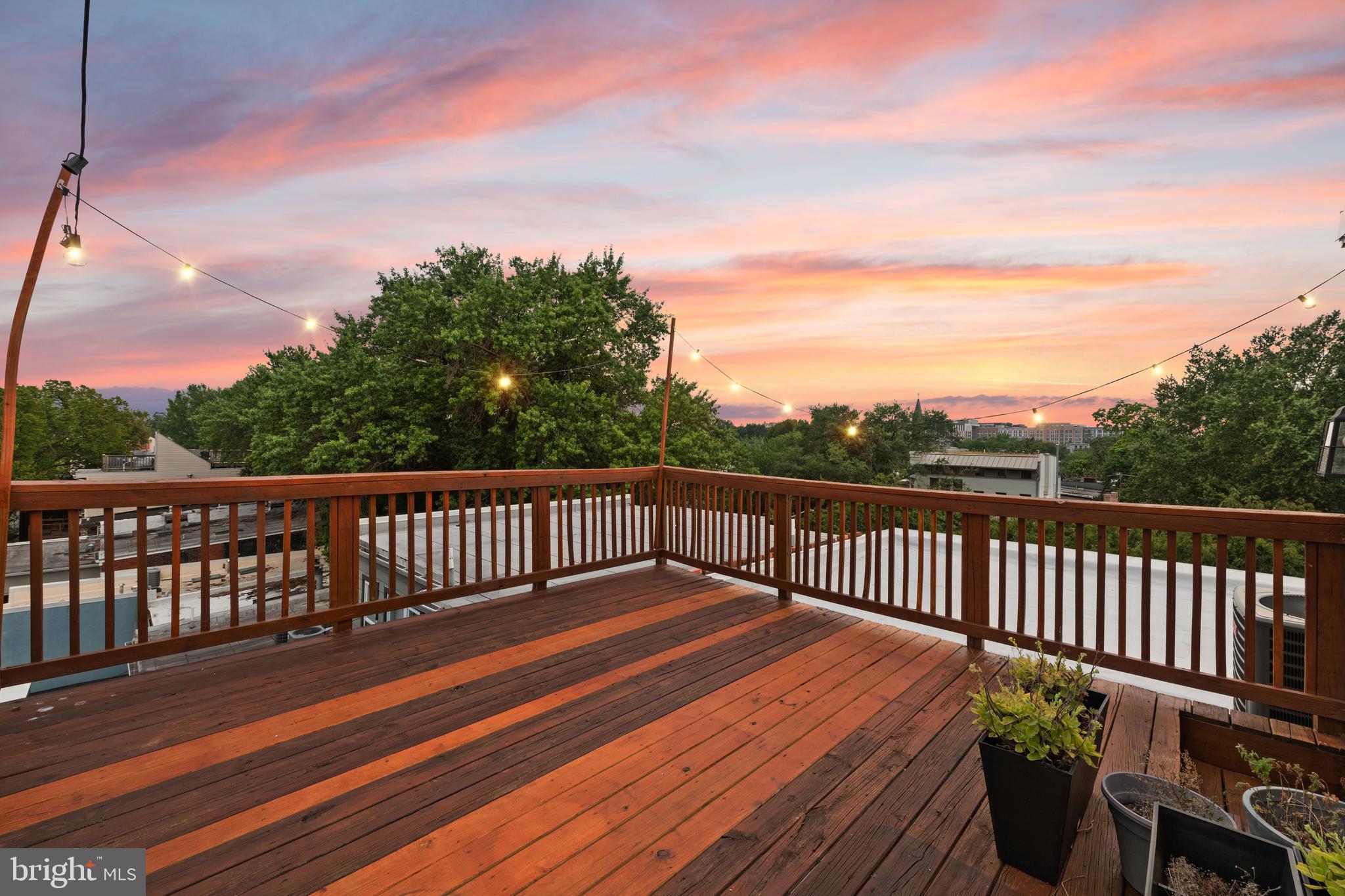 1645 New Jersey Avenue Northwest, Unit 2 Washington, DC 20001 - Photo 47 of 49 a balcony with wooden floor and fence