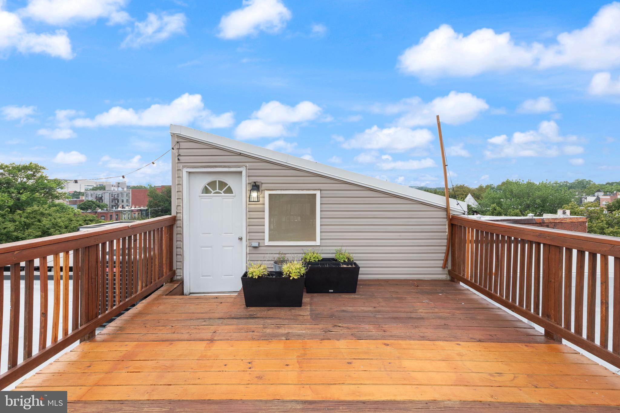 1645 New Jersey Avenue Northwest, Unit 2 Washington, DC 20001 - Photo 49 of 49 a view of a terrace with couches and sky view
