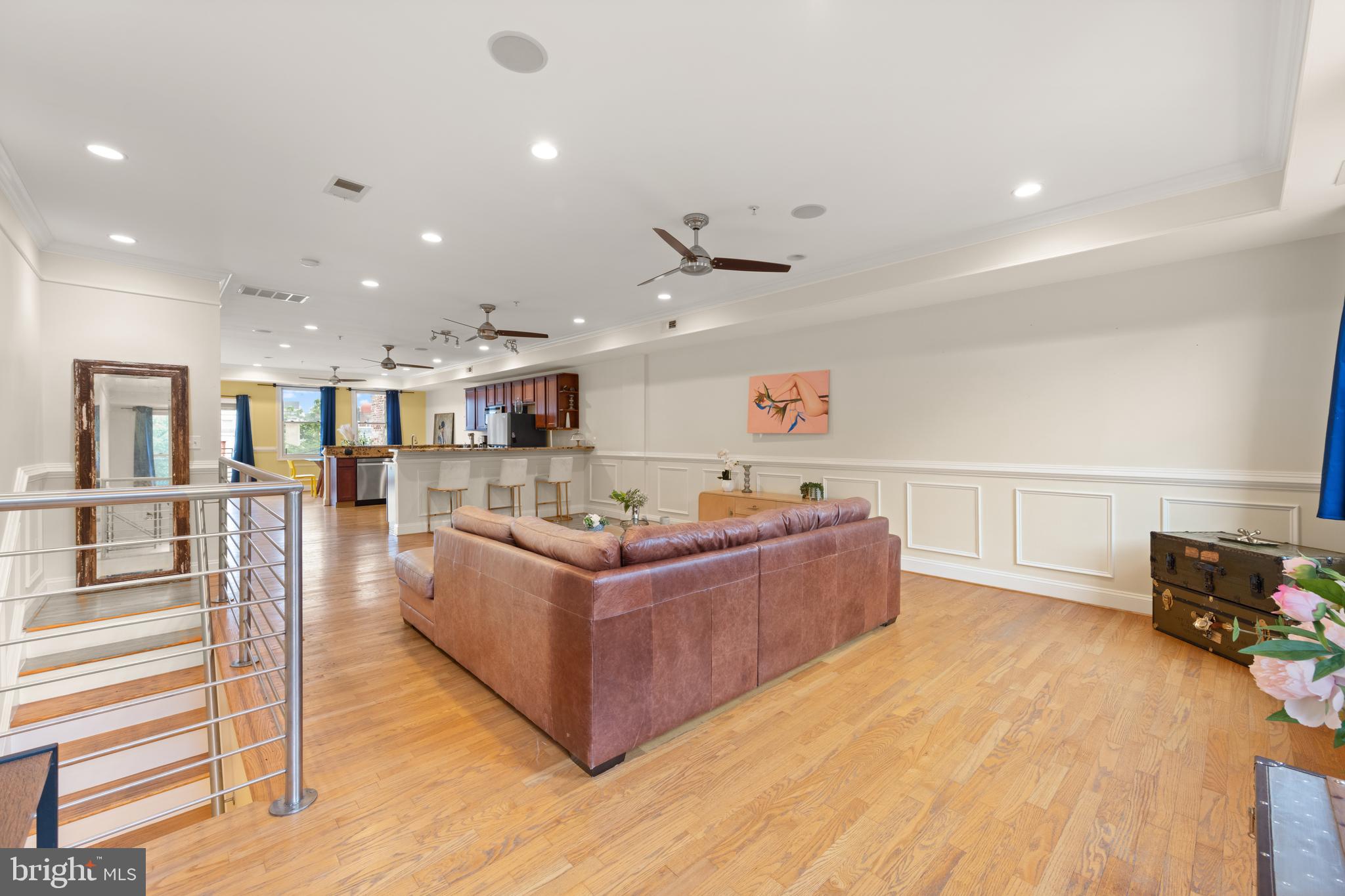 1645 New Jersey Avenue Northwest, Unit 2 Washington, DC 20001 - Photo 6 of 49 a living room with furniture and a wooden floor