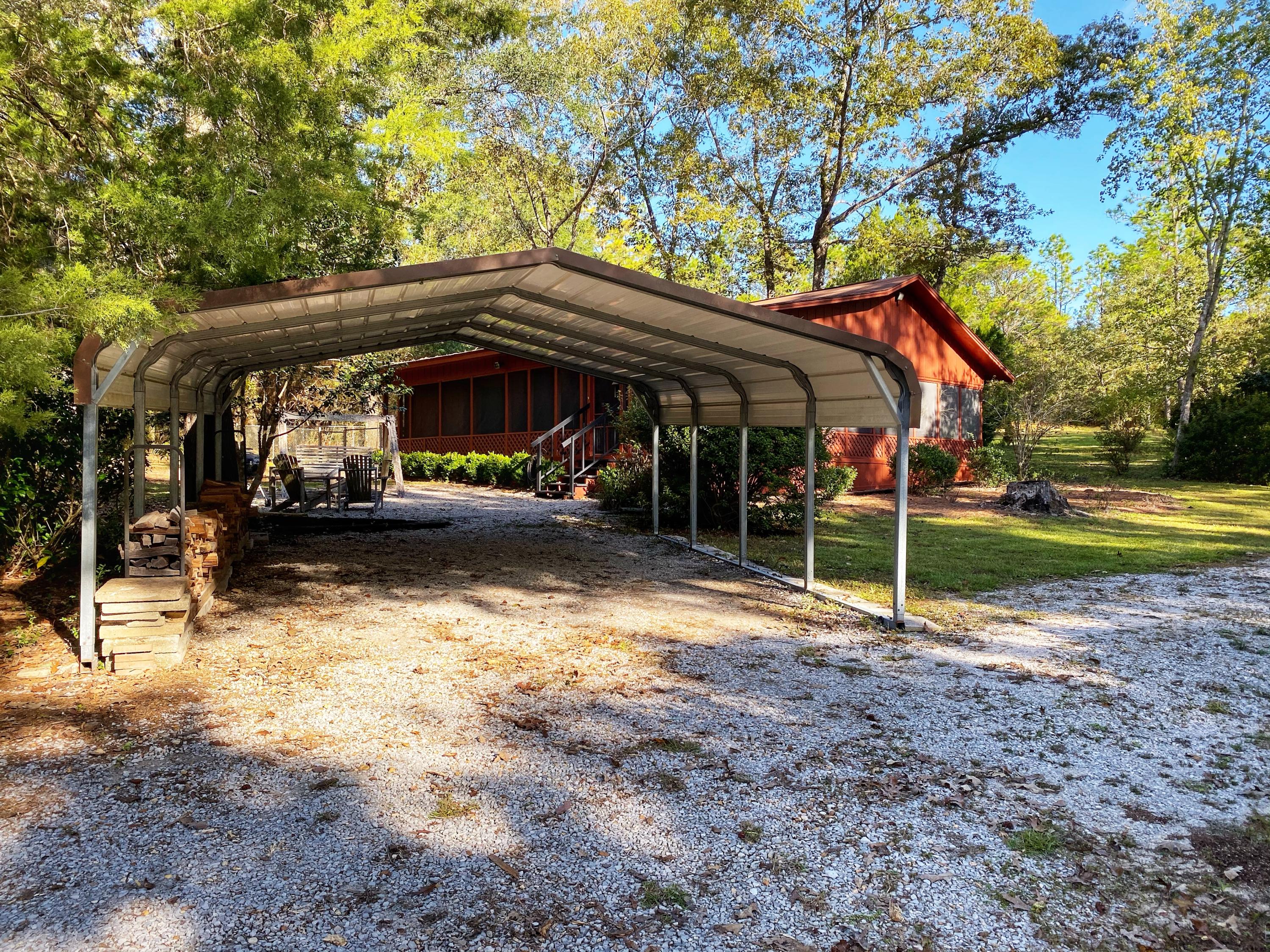 1171 Spring Lake Road DeFuniak Springs, FL 32433 - Photo 2 of 36 Carport