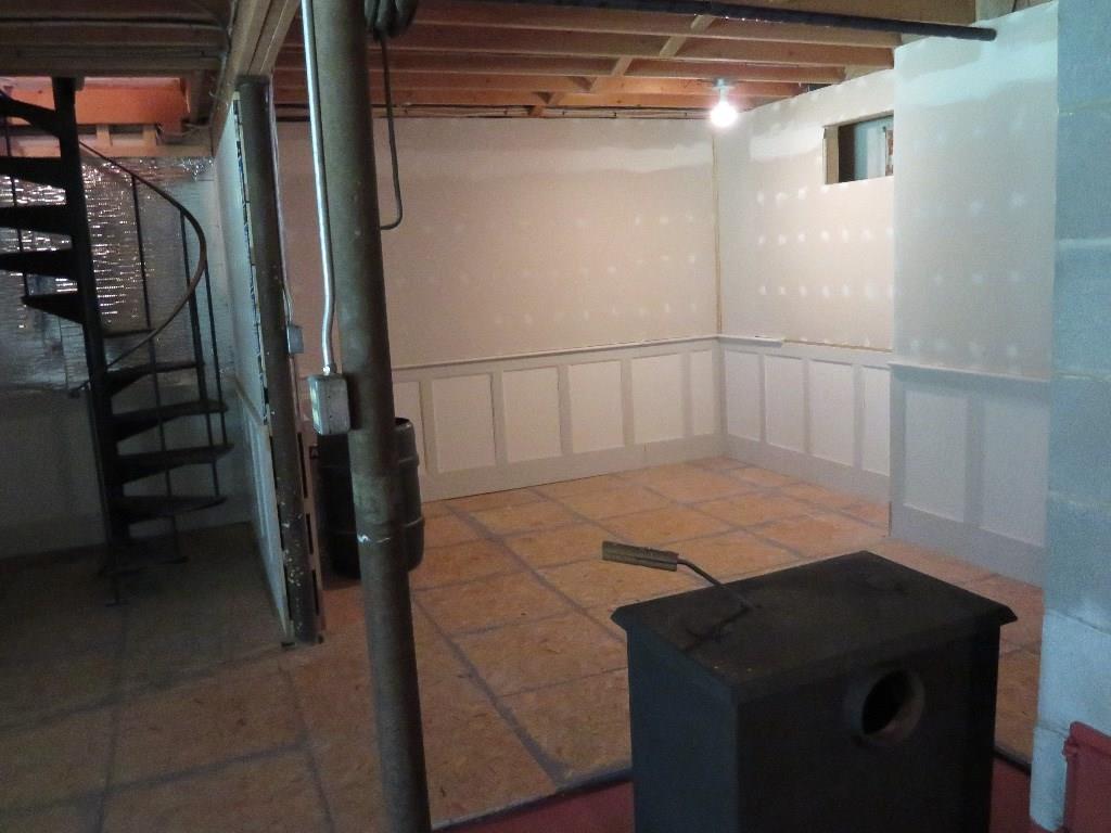 69 Pemaquid Harbor Road Pemaquid, ME 04558 - Photo 10 of 12 Basement level with detached wood stove.