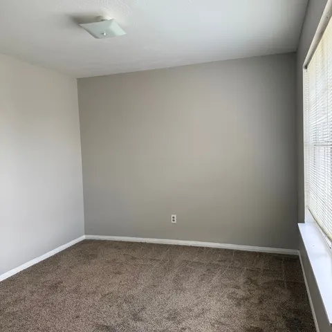 an empty room with a window