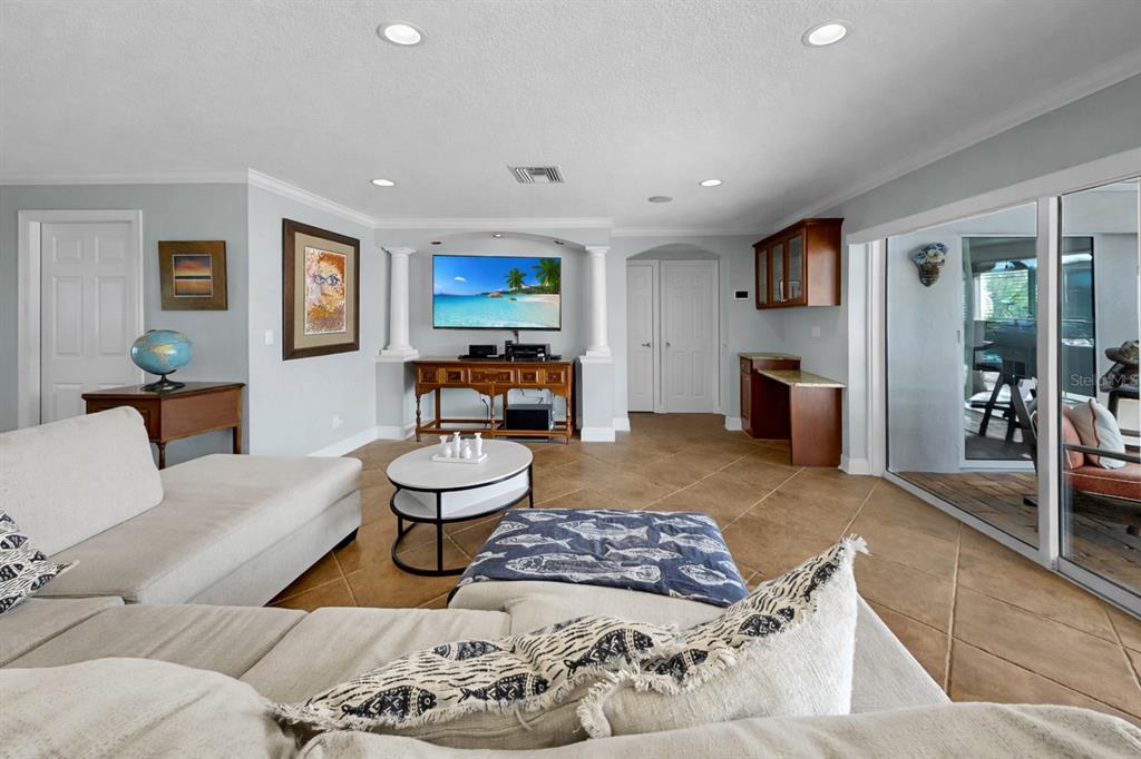 6317 Cocoa Lane Apollo Beach, FL 33572 - Photo 12 of 63 a living room with furniture and a table