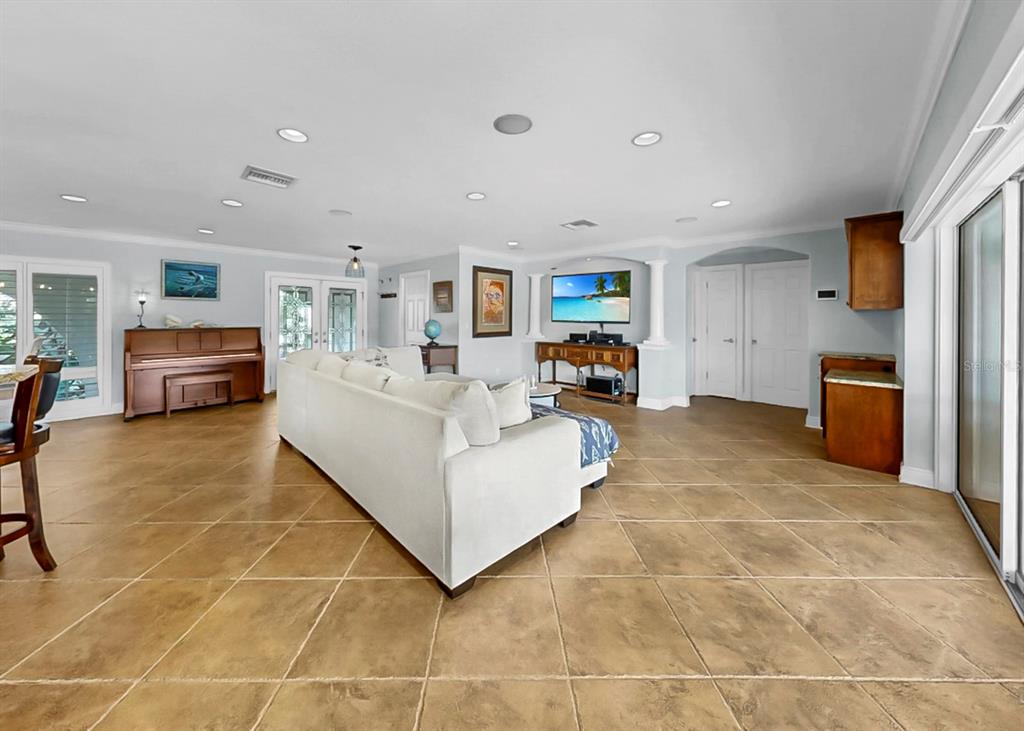 6317 Cocoa Lane Apollo Beach, FL 33572 - Photo 14 of 63 a living room with furniture and a flat screen tv