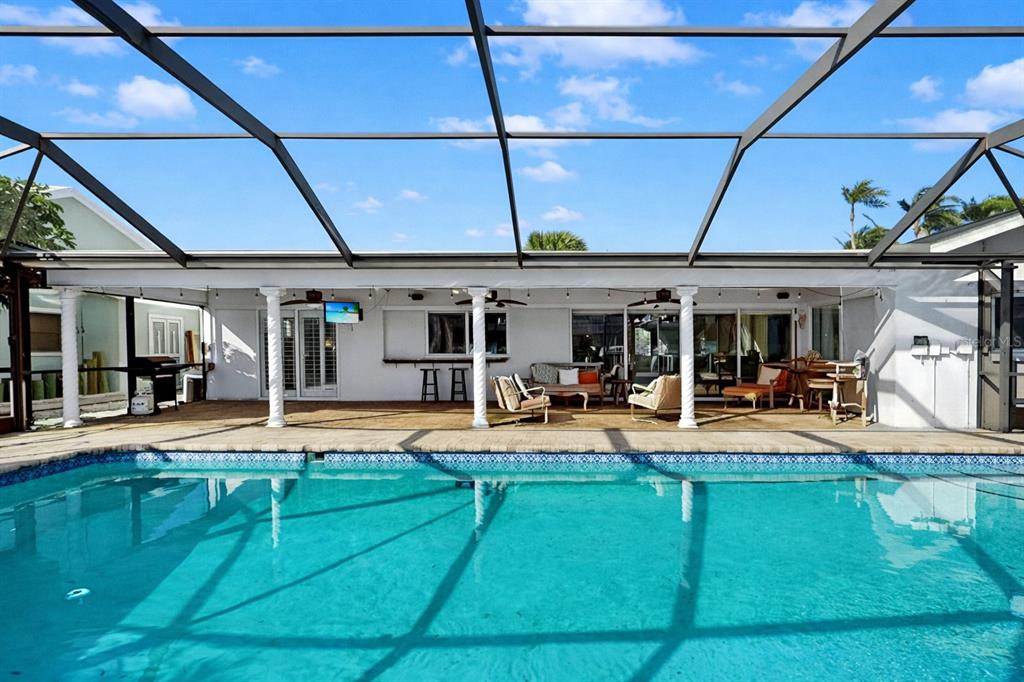 6317 Cocoa Lane Apollo Beach, FL 33572 - Photo 49 of 63 a view of a house with swimming pool and sitting area