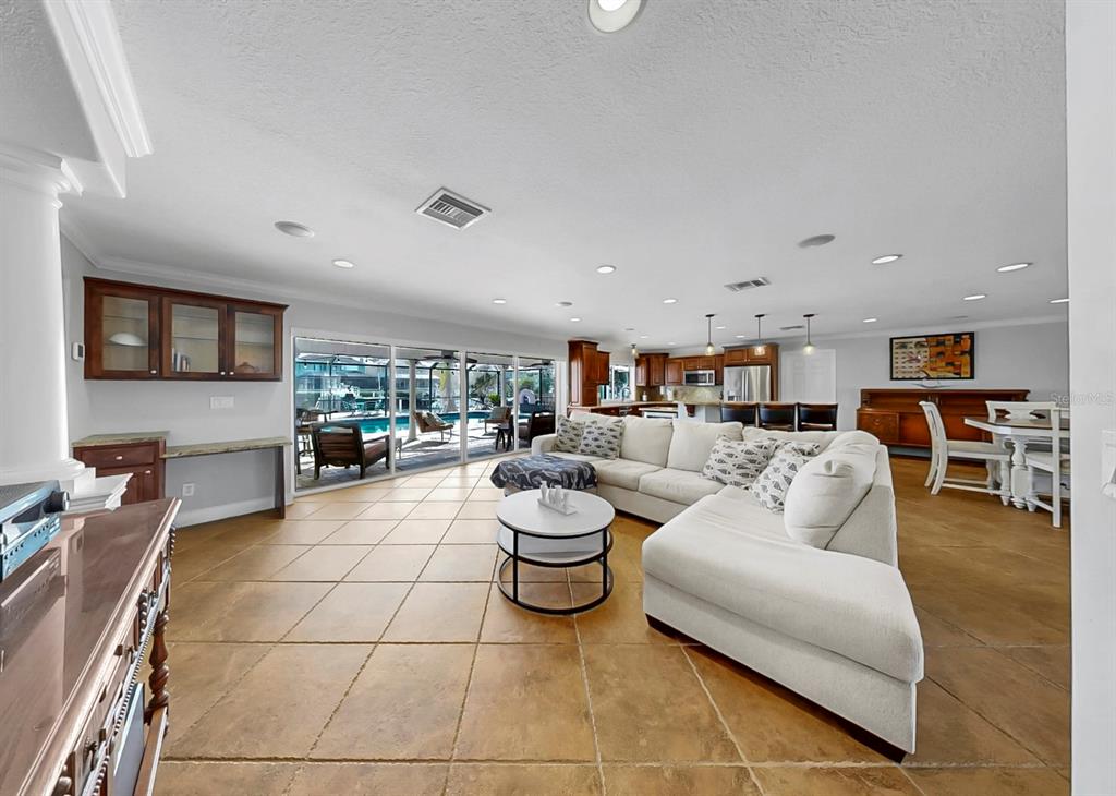 6317 Cocoa Lane Apollo Beach, FL 33572 - Photo 9 of 63 a living room with furniture and a flat screen tv