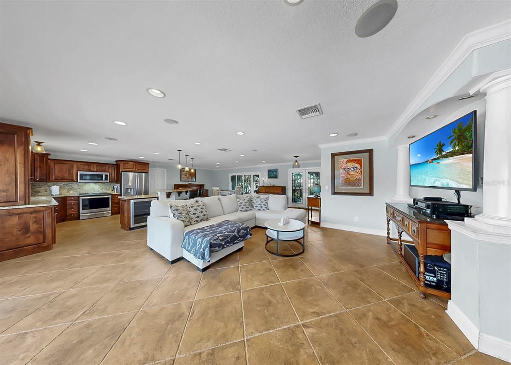 6317 Cocoa Lane Apollo Beach, FL 33572 - Photo 10 of 63 a living room with furniture and a flat screen tv