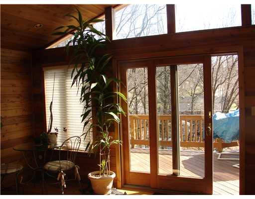 820 Flint Ridge Road Mt. Lebanon, PA 15243 - Photo 7 of 18 Sunroom. Sun room off the family room and access to the deck