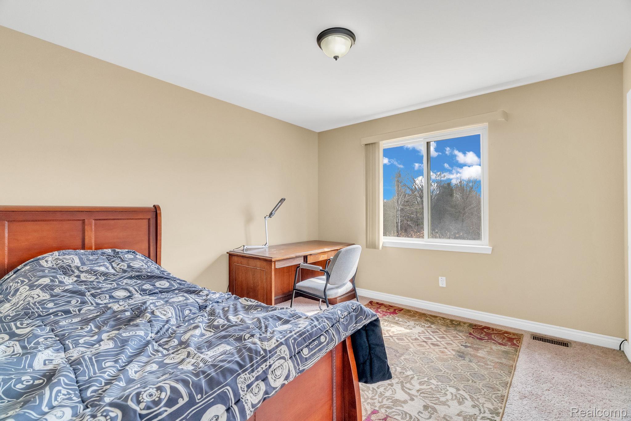 4122 Hawks Nest Road Utica, MI 48317 - Photo 48 of 74 Bedroom featuring baseboards and light colored carpet
